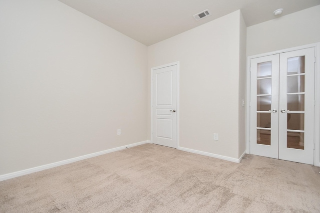 24703 Heirloom Ln, Katy, TX 77493 - unfurnished room with french doors and carpet flooring