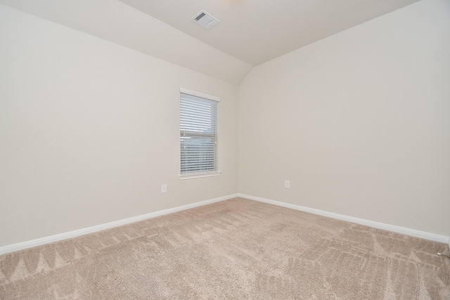 24703 Heirloom Ln, Katy, TX 77493 - empty room featuring light colored carpet and vaulted ceiling