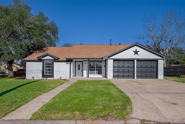 ranch-style house with driveway, a garage, a front yard, and brick siding