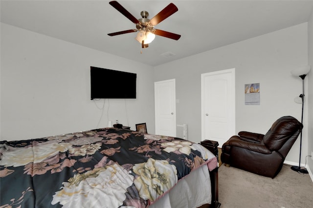 bedroom featuring carpet and a ceiling fan