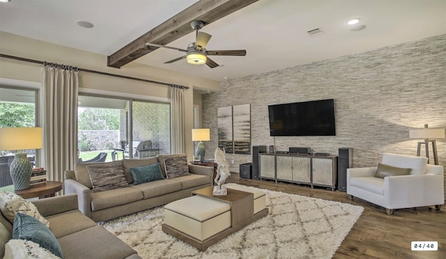 living room featuring beam ceiling, recessed lighting, visible vents, a ceiling fan, and wood finished floors