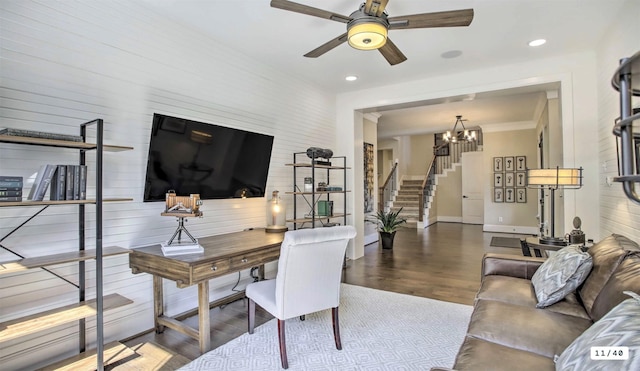 home office featuring recessed lighting, baseboards, wood finished floors, and ceiling fan with notable chandelier