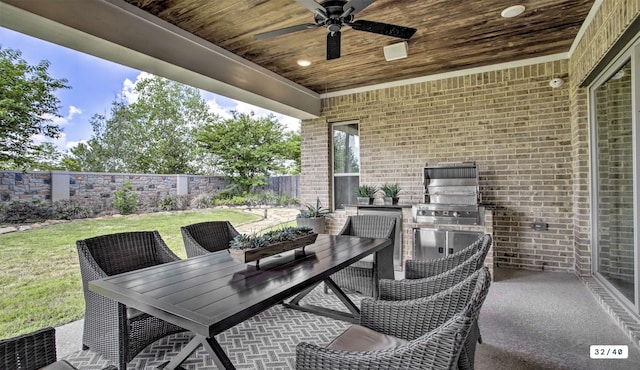 view of patio with a fenced backyard, a ceiling fan, and outdoor dining space