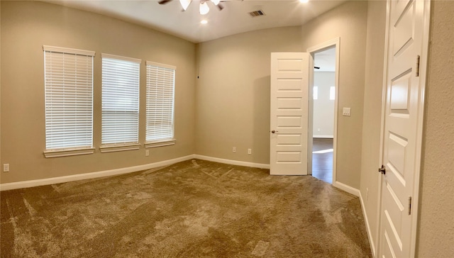 unfurnished room featuring recessed lighting, carpet flooring, visible vents, and baseboards