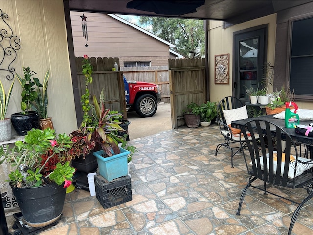 8111 Ivan Reid Dr, Houston, TX 77040 - view of patio / terrace with fence and outdoor dining area