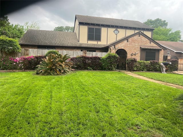 8111 Ivan Reid Dr, Houston, TX 77040 - english style home with roof with shingles and brick siding