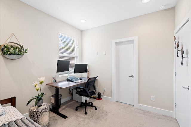 carpeted office space with recessed lighting and baseboards