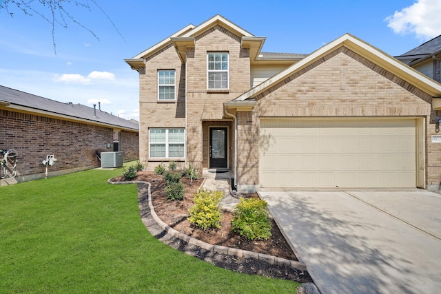 traditional-style home with an attached garage, central AC, brick siding, concrete driveway, and a front lawn