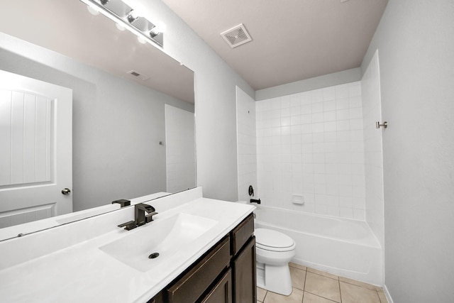 bathroom featuring visible vents, vanity, toilet, and tile patterned floors