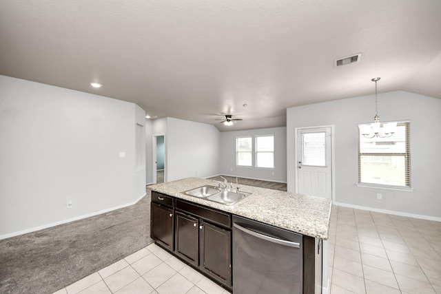 kitchen with visible vents, dishwasher, open floor plan, light countertops, and a sink