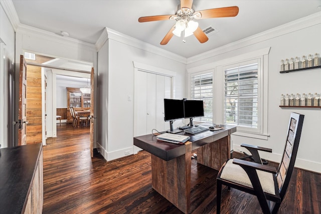 office with dark wood-style floors, visible vents, ornamental molding, a ceiling fan, and baseboards