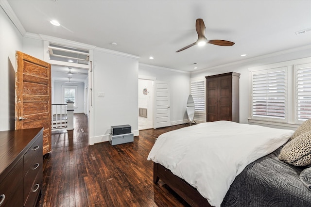 bedroom featuring baseboards, visible vents, dark wood-style floors, ornamental molding, and recessed lighting