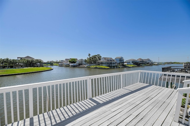 deck featuring a water view