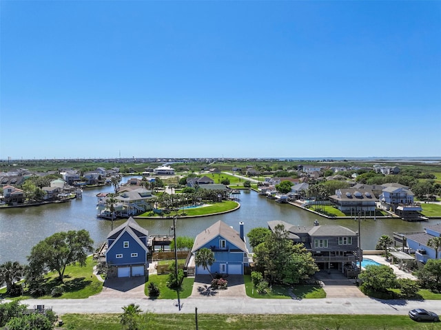 aerial view with a water view and a residential view