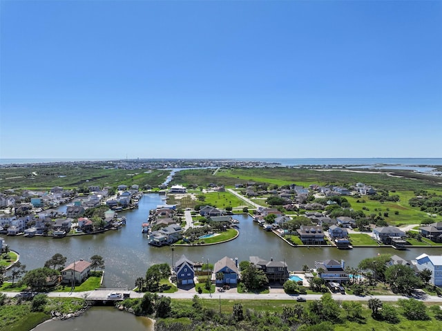 bird's eye view with a water view and a residential view