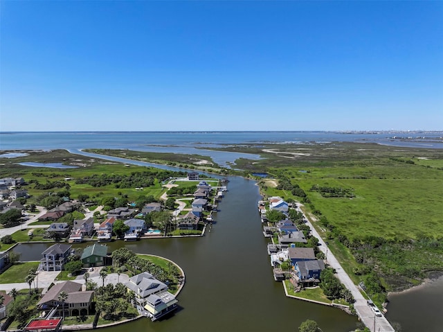 bird's eye view featuring a residential view and a water view