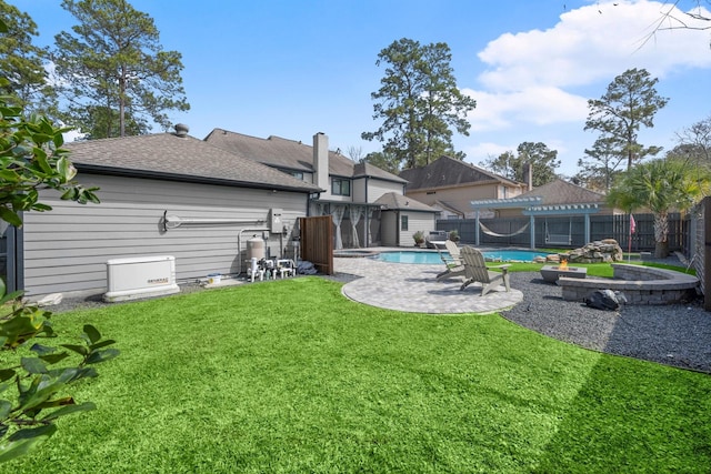 view of yard featuring a fenced in pool, a fenced backyard, and a patio area