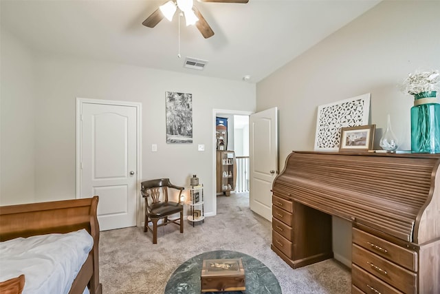 bedroom with light carpet, visible vents, and a ceiling fan