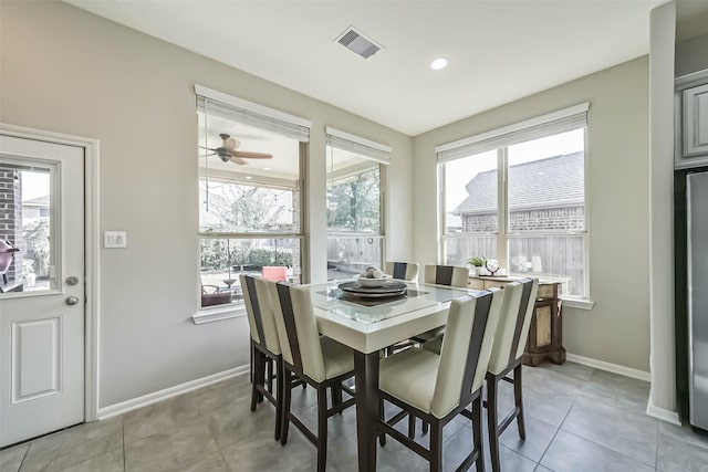 dining room featuring light tile patterned floors, recessed lighting, a ceiling fan, visible vents, and baseboards