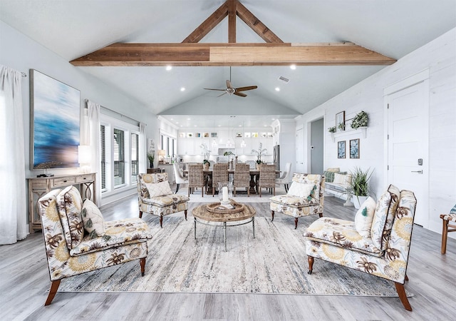 636 Villa Dr, Crystal Beach, TX 77650 - living area featuring high vaulted ceiling, wood finished floors, visible vents, a ceiling fan, and beam ceiling