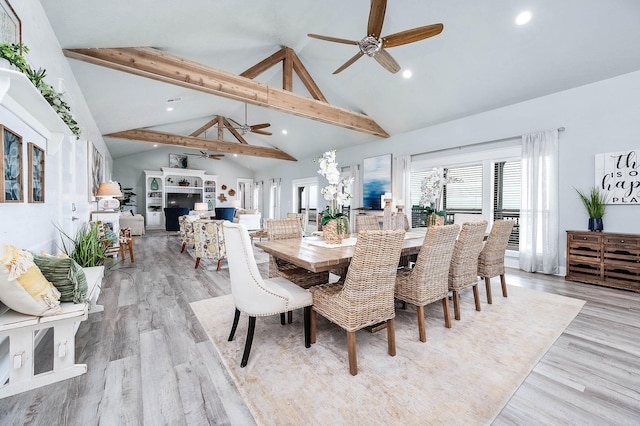 636 Villa Dr, Crystal Beach, TX 77650 - dining area featuring light wood-type flooring, high vaulted ceiling, beam ceiling, and recessed lighting