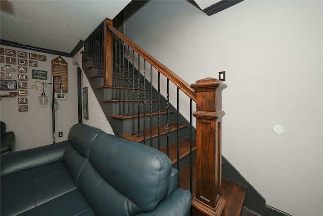 stairway with crown molding