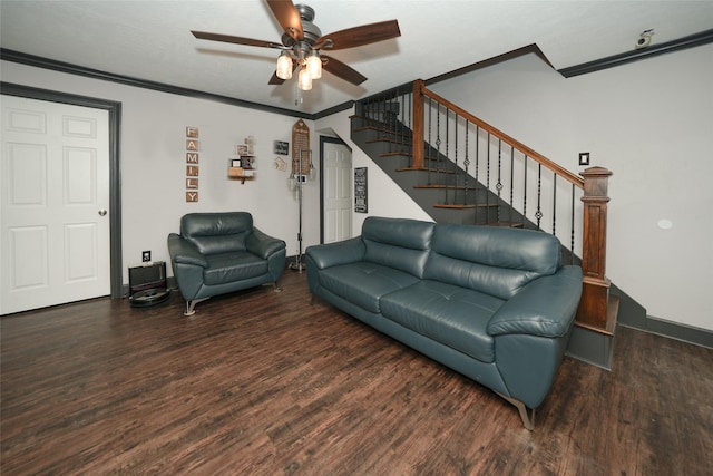 living room featuring ornamental molding, a ceiling fan, stairway, and wood finished floors