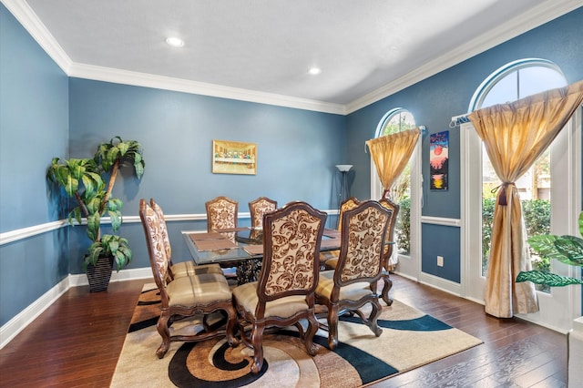 dining area featuring hardwood / wood-style flooring, baseboards, ornamental molding, and recessed lighting