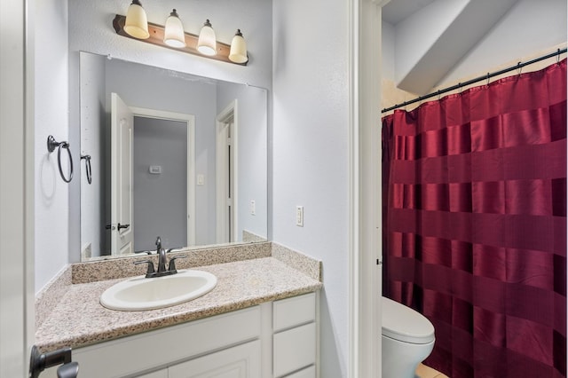 full bathroom with toilet, a shower with curtain, and vanity