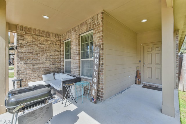 view of patio / terrace with outdoor lounge area and a grill