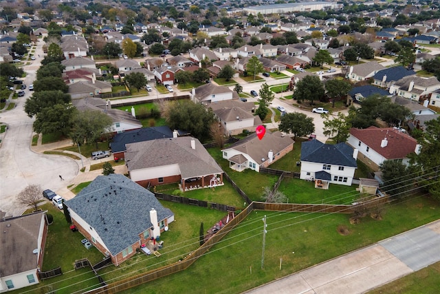 birds eye view of property with a residential view