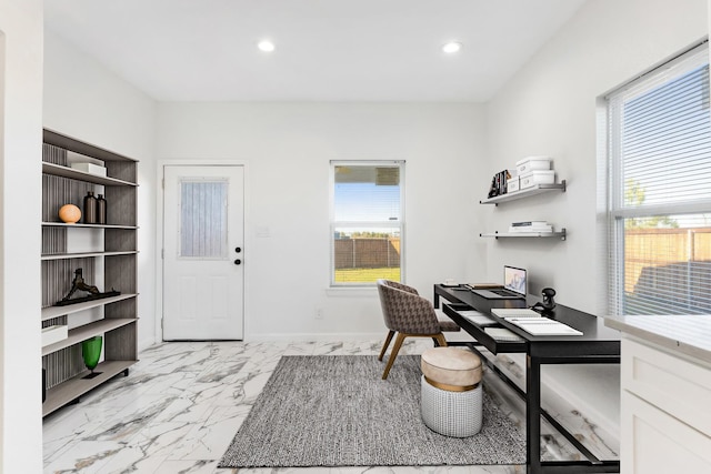 home office with recessed lighting, marble finish floor, and baseboards