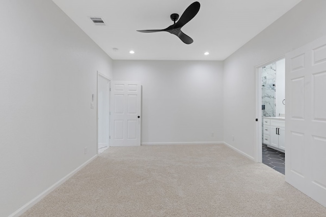 spare room featuring visible vents, baseboards, carpet, recessed lighting, and a ceiling fan