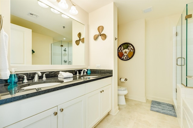 full bath featuring toilet, a shower stall, visible vents, and a sink