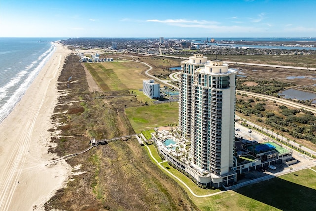 birds eye view of property with a view of city, a water view, and a view of the beach