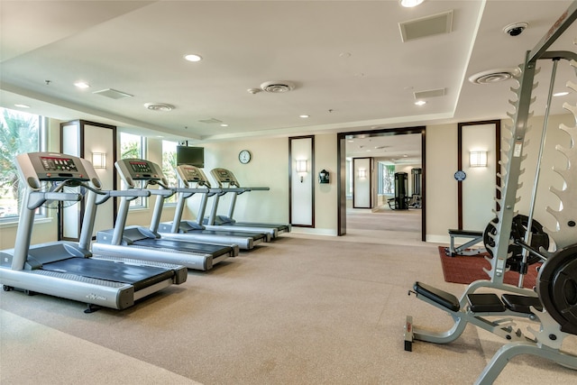 workout area with recessed lighting, visible vents, and baseboards