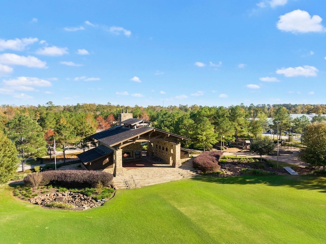 aerial view featuring a wooded view