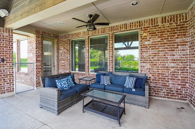 view of patio featuring an outdoor hangout area and a ceiling fan