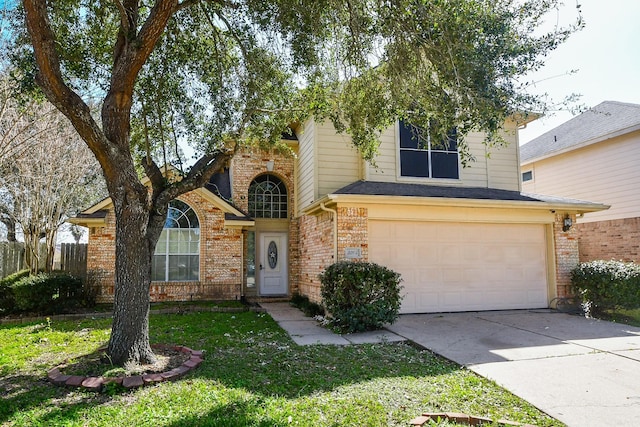 traditional home featuring driveway, an attached garage, fence, and brick siding