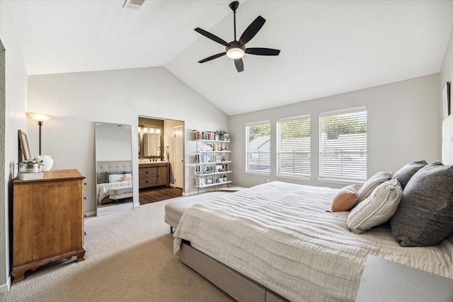 bedroom with lofted ceiling, ceiling fan, connected bathroom, carpet floors, and visible vents