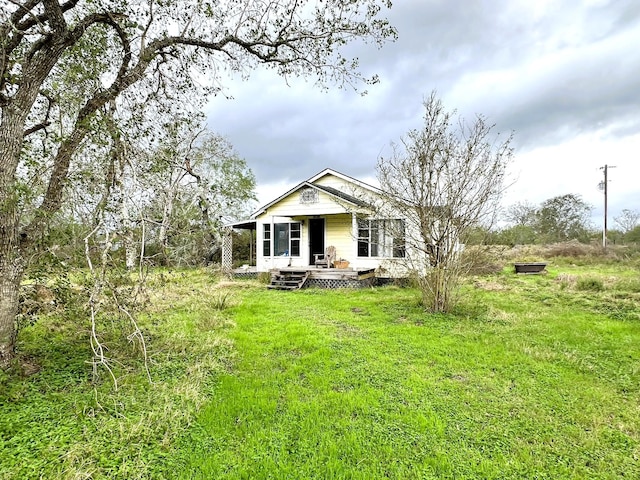 38440 Fisk Ln, Pattison, TX 77423 - rear view of house with covered porch