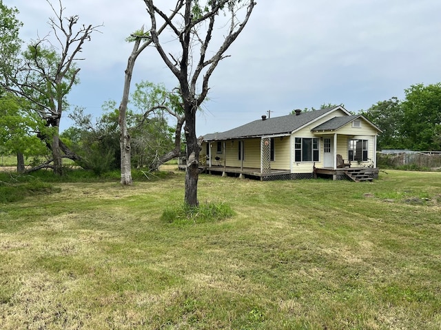 38440 Fisk Ln, Pattison, TX 77423 - view of green lawn with a wooden deck