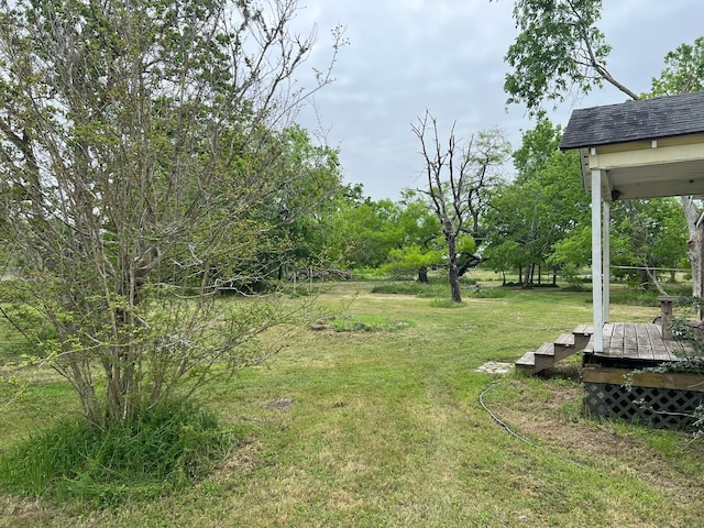38440 Fisk Ln, Pattison, TX 77423 - view of green lawn with a deck