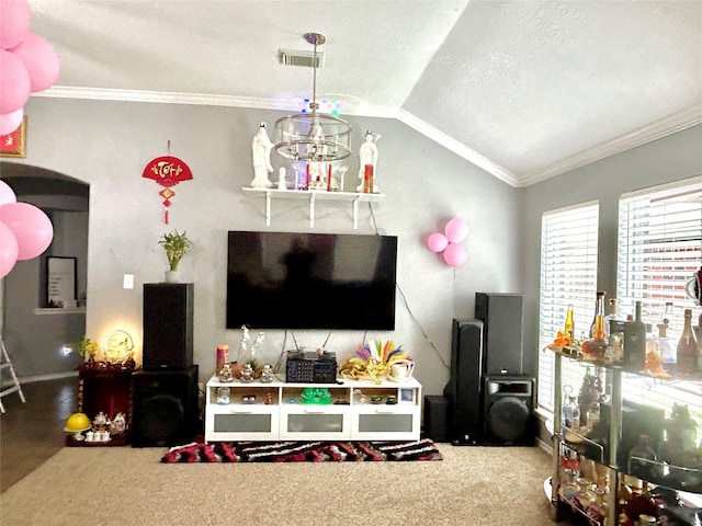 carpeted living area featuring lofted ceiling, arched walkways, visible vents, and crown molding