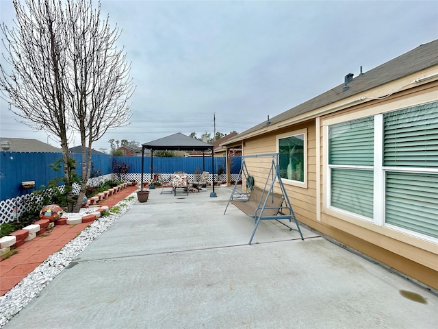 view of patio with a fenced backyard