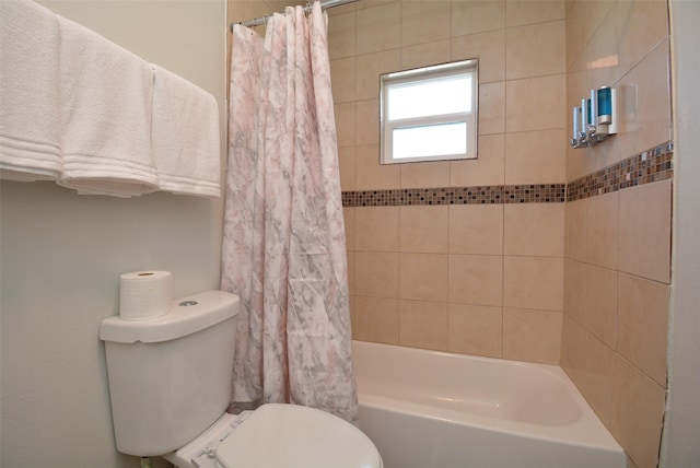 bathroom with toilet and shower / bath combination with curtain