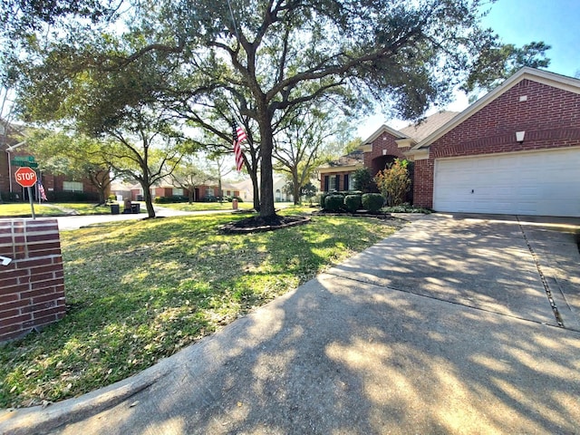 exterior space with concrete driveway and an attached garage