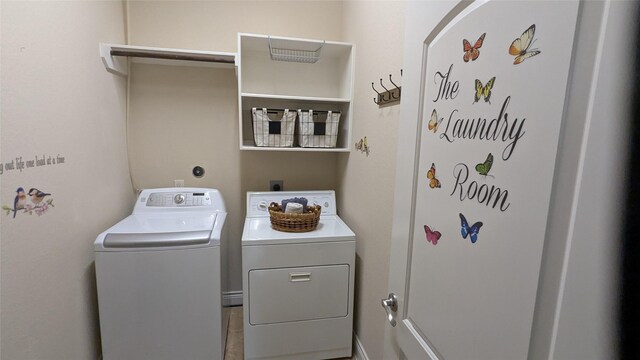 washroom with laundry area and independent washer and dryer