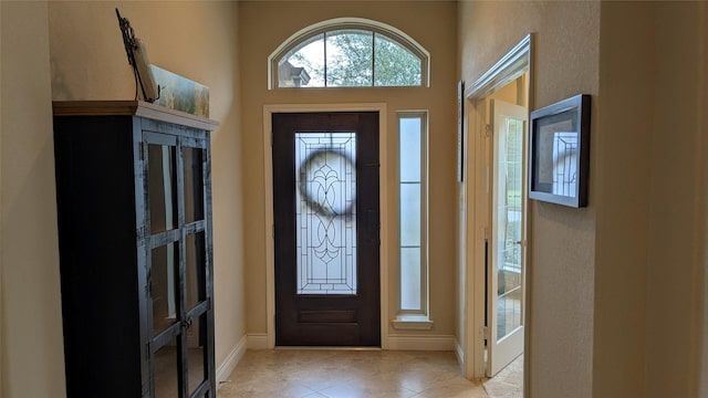 entryway featuring light tile patterned floors