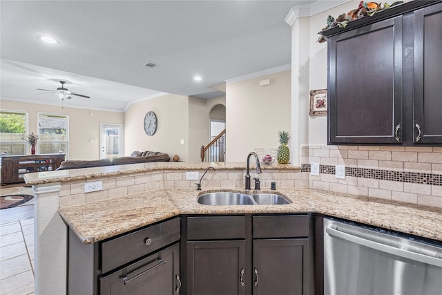 24111 Auburn Woods Ct, Porter, TX 77365 - kitchen with stainless steel dishwasher, a sink, ornamental molding, a peninsula, and ceiling fan